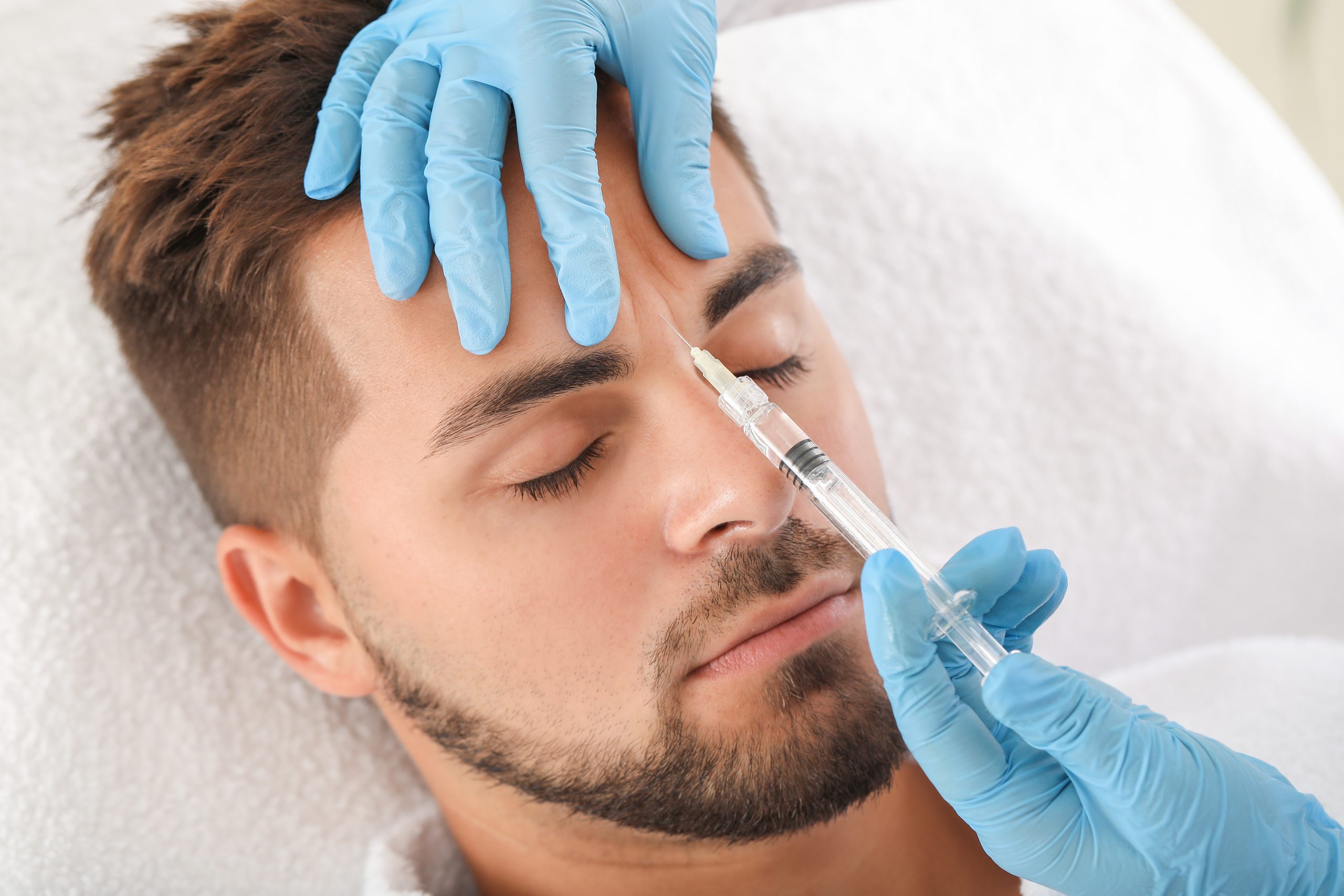 Man die facetox behandeling ondergaat